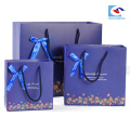 OEM custom luxury high quality printed paper gift bag with PP handle